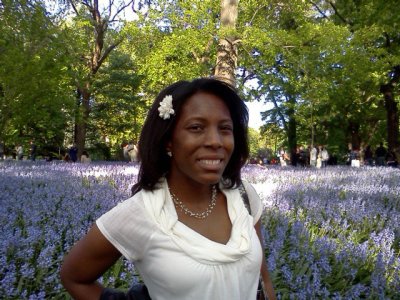Monique Lewis in field of flowers